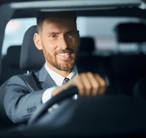 Professional Chauffeur Driving a Luxury Vehicle