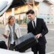 Ocean County Limo Service: Reliable Rides Anytime, 24/7 2 Chauffeur assisting a client with luggage for luxury transportation in Ocean County with Noor Limousine LLC limo service.