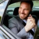 Business traveler enjoying comfortable ride with Bergen County black car service